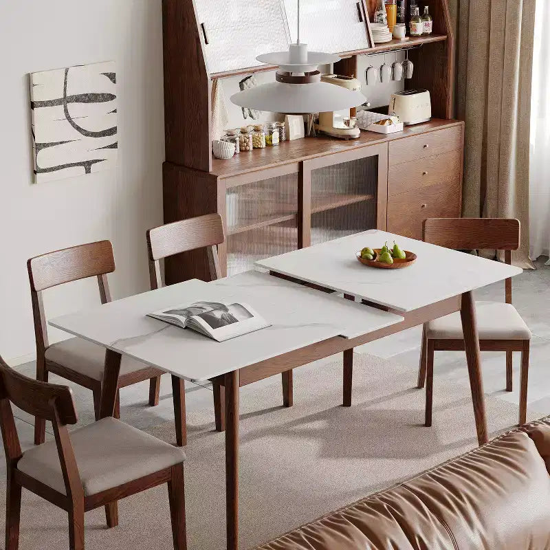 Modern eikenhouten rechthoekige uitschuifbare eettafel met afgeronde hoeken en diagonale poten